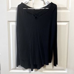Black long sleeve with crisscross neck